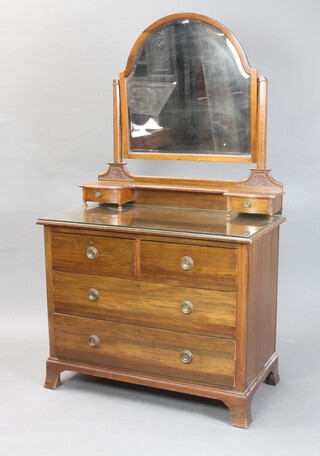 An Edwardian inlaid mahogany dressing chest with arch plate bevelled plate mirror, the base fitted 2 glove drawers above 2 short and 2 long drawers, raised on splayed bracket feet 172cm h x 98cm w x 53cm d 