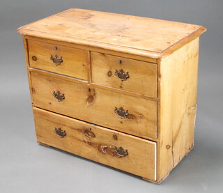A 19th Century pine chest of 2 short and 2 long drawers with brass swan neck drop handles 66cm h x 84cm w x 46cm d (split to top, some water marks) 