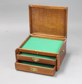 A 1930's rectangular oak canteen fitted 2 drawers and brass countersunk handles, complete with key 23cm h x 47cm w x 38cm d 