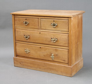 A Victorian bleached walnut chest of 2 short and 2 long drawers raised on bracket feet with brass drop handles 79cm h x 92cm w x 44cm d (sun bleaching and water marks to the top) 