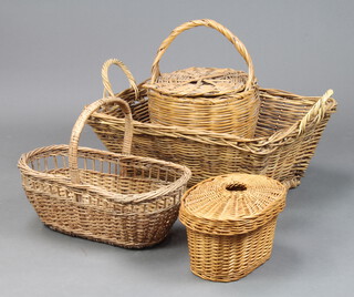 A rectangular twin handled basket 24cm h x 61cm w x 47cm d, an oval shopping basket 15cm x 44cm x 26cm, an oval lidded basket 16cm x 31cm x 19cm and a circular basket with lid 23cm x 30cm 