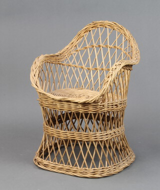 A child's wicker tub back chair 50cm h x 33cm w x 32cm d (some damage in places)
