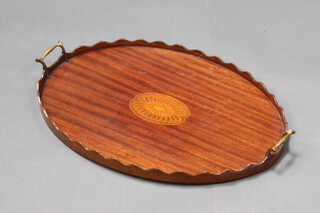 An Edwardian style oval inlaid mahogany twin handled tray with wavy border 56cm x 41cm 