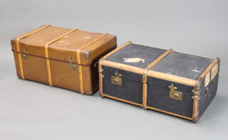 A wooden and fibre bound cabin trunk with part GWR and Southern labels 32cm h x 77cm x 49cm  (missing handles) together with 1 other 38cm x 76cm x 43cm  