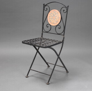 A metal cafe style folding chair 87cm h x 38cm w x 39cm d 