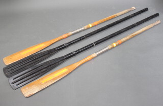 A pair of wooden oars 167cm l x 13cm w together with 2 plastic oars 181cm l x 14cm w