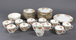 An Edwardian Moore china part tea set decorated flowers