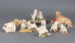 A Royal Osborne porcelain group of 3 puppies and 3 composition dog groups 