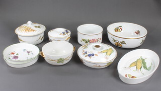 A quantity of Royal Worcester Evesham dinner ware comprising an oval casserole, fruit bowl, 2 souffles, 3 tureens and covers 
