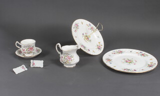 A Royal Standard part tea set together with a cake stand and place settings