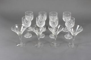 Four cocktail glasses and 8 small wine glasses