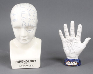 A reproduction phrenology bust together with a ditto palmistry hand 