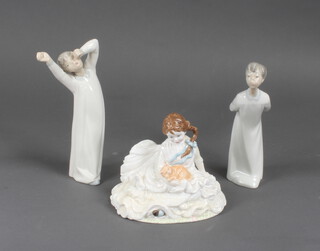 A Royal Worcester figure - Safe at Last together with a Lladro figure and a Nao figure