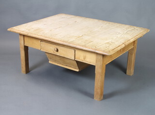 A square pine dough bin style coffee table raised on square supports 53cm h x 120cm w x 91cm d (some ring and contact marks) 