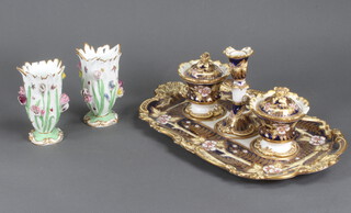 A 19th Century English porcelain inkstand (a/f) together with a pair of ditto vases encrusted with flowers and insects (a/f) 