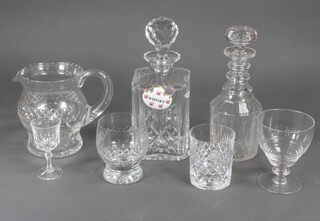 A quantity of table glassware including water jugs, decanters, glassware etc 