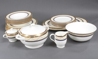 A Royal Bone China Brittany pattern part dinner service decorated with scrolls and flowers 