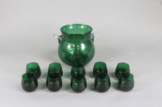 A green glass punch bowl together with 10 ditto glasses