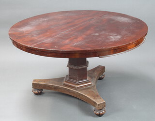 A 19th Century mahogany circular breakfast table on a hexagonal column and triform base 72cm h x 130cm diam. 
