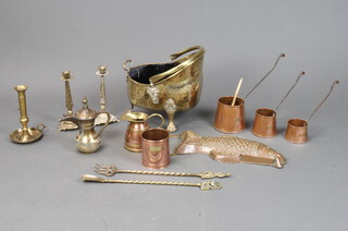 A brass helmet coal scuttle, a pair of candlesticks and minor metalware 