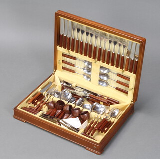 A canteen of 1960's stainless steel and teak cutlery
