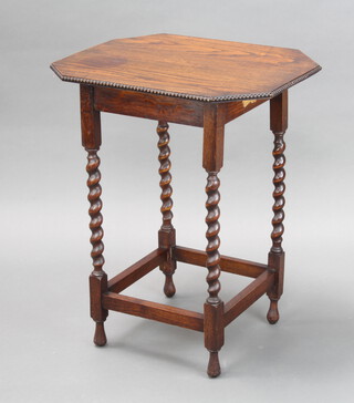 A 1930's oak lozenge shaped occasional table on spiral turned supports with box framed stretcher 74cm h x 59cm w x 48cm d (light scratches, top warped) 