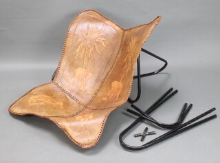 A 1960's tubular metal and leather designer chair 