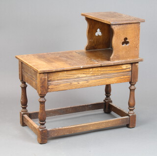 A rectangular bleached oak telephone seat with hinged lid, raised on turned and block supports 65cm h x 66cm w x 37cm d 
