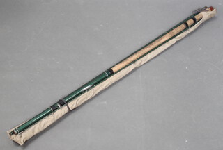 A 1970's 12' fishing rod and a handbuilt 12' Made in Sudbury 1960's match rod 
