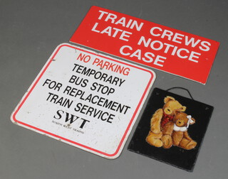A South West Trains "No Parking Temporary Bus Stop" sign 46cm, a plastic Train Crew late notice case 26cm x 62cm, together with an oil painting on slate study of 2 seated teddy bears 31cm x 25cm 
