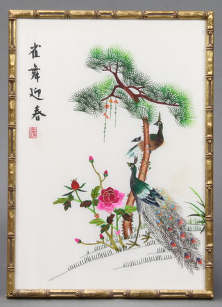 20th Century Japanese silkwork embroidery of peacocks beneath a tree 39cm x 27cm contained in a faux bamboo frame