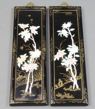 A pair of Chinese lacquered and hardstone inlaid rectangular panels decorated with flowers 43cm x 13cm 