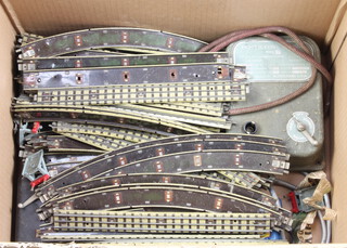 A Matchbox Powerpack M713, 2 Hornby Dublo controller, a power controller unit type A3 and various rails 