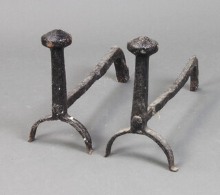 A pair of 19th Century iron fire dogs 
