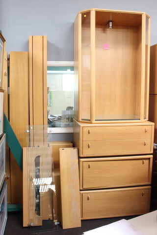 Two Holtkamp oak finished wall units fitted various shelves, cabinets, drawers, etc  