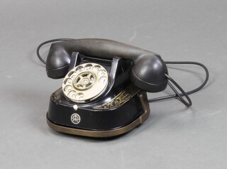 A TRT bell dial telephone (receiver f) 