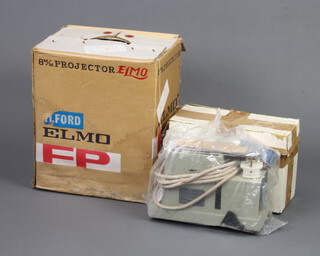 An Ilford Elmo 8mm cine projector together with a slide projector  