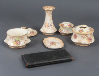 A cased geometry set and a 5 piece Crown Ducal dressing table set