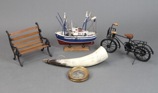 A wooden model of a fishing boat 28cm, a model bench, bike, horn and oval miniature 