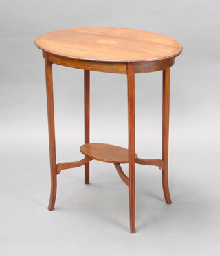 An Edwardian oval inlaid mahogany two tier occasional table on outswept supports 70cm h x 61cm w x 45cm d (some contact marks and water splashes to the top) 