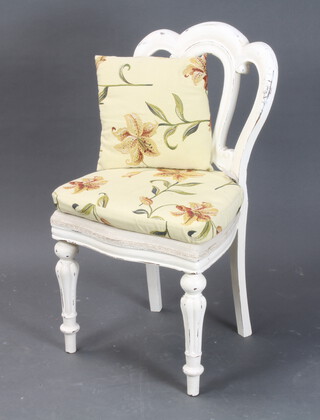 A Victorian white painted mahogany tulip back dining chair with serpentine seat