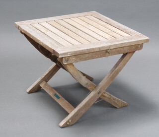 A rectangular hardwood slatted folding garden table 43cm h x 51cm w x 51cm (old repair to the legs) 