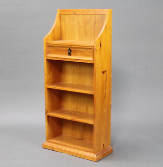 A 4 tier pine bookcase, fitted a drawer 105cm h x 46cm w x 23cm d 