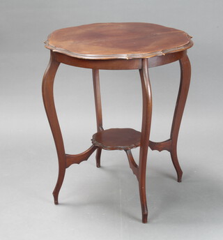 An Edwardian circular mahogany 2 tier occasional table raised on cabriole supports 69cm h x 62cm diam. 