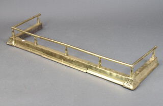 A gilt metal railed expanding fire curb 14cm h x 110cm w x 36cm d 