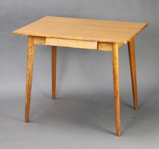 A rectangular beech framed table fitted a frieze drawer with woodgrain formica top 75cm h x 90cm l x 60cm w  