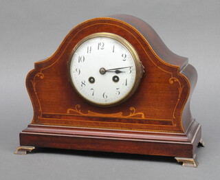 An Edwardian French 8 day striking mantel clock with enamelled dial and Arabic numerals contained in an arch shaped inlaid mahogany case, the brass back plate marked France, striking on a gong, complete with key and pendulum 22cm h x 29cm w x 13cm d 
