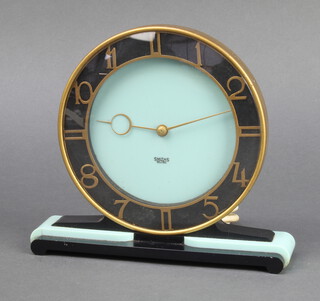 A 1950's Smiths electric mantel timepiece, the 16cm turquoise dial with black and gilt chapter ring, Roman numerals, marked Smiths Electric, reverse marked SEC 17cm x 20cm x 6cm  