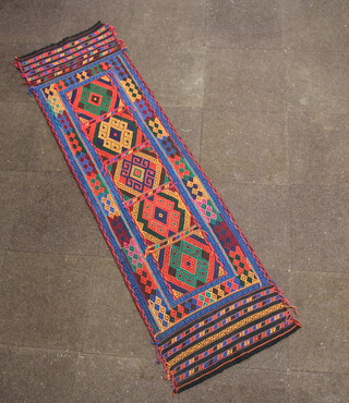 A blue, orange and red ground Suzni Kilim runner with 5 panels to the centre 236cm x 66cm 