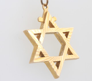 A 9ct yellow gold Star of David pendant, 35mm, 9.5 grams